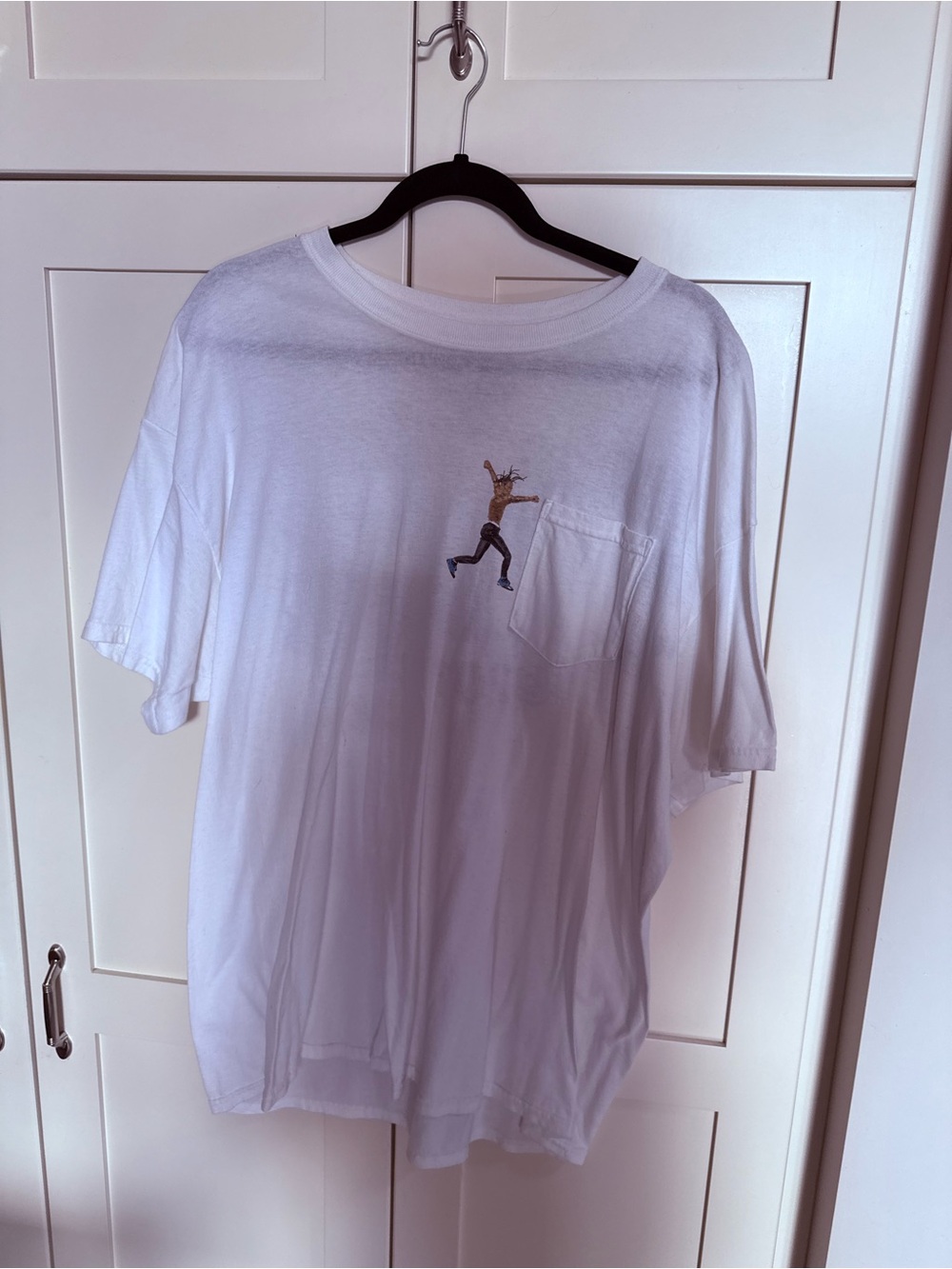 Cactus Jack by Travis Scott White Pocket Tee with Small Jumping Figure Graphic